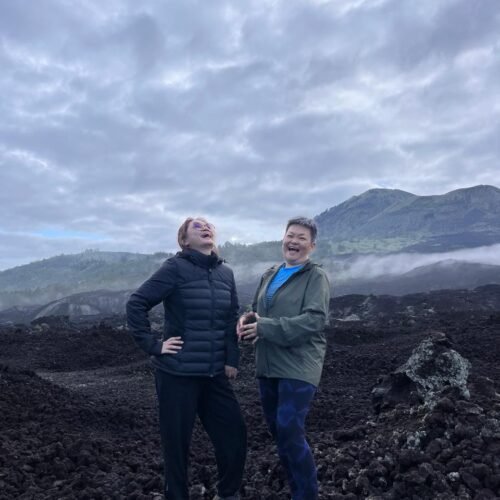 Mount Batur sunrise and black lava