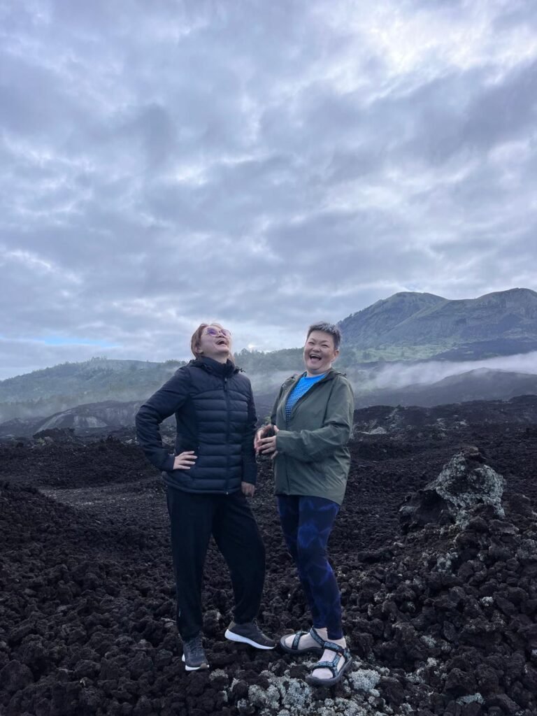 Mount Batur sunrise and black lava